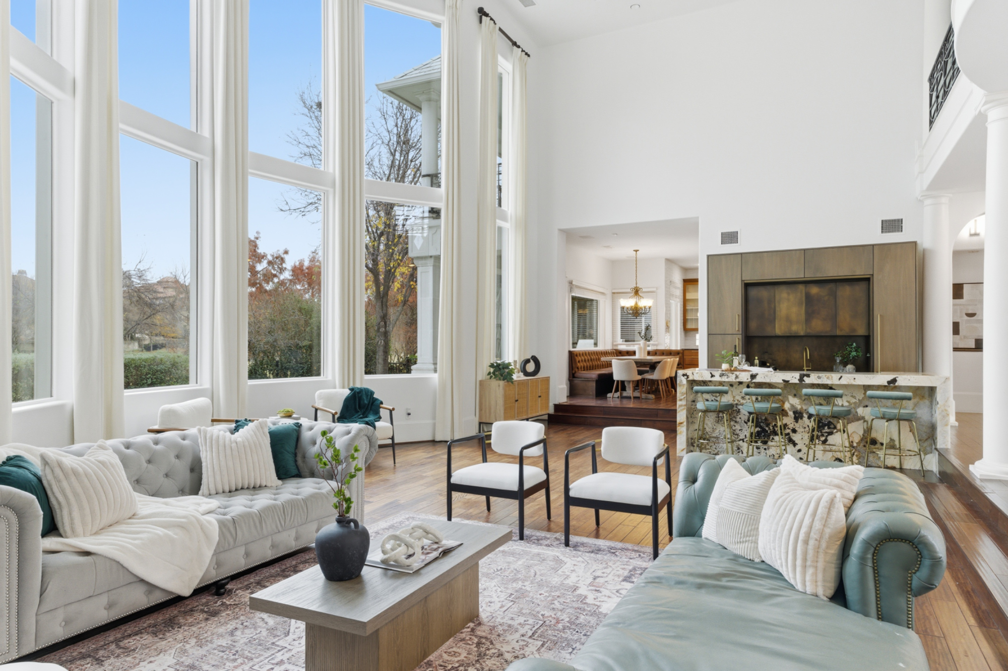 Luxury living room with floor to ceiling windows
